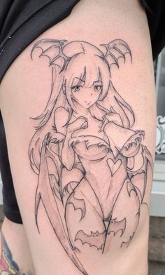 a woman's thigh with an anime character tattoo on it