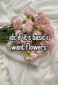 some pink flowers laying on top of a white sheet with the words icf it's basic i want flowers