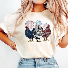 Comfort Colors® Patriotic USA Chicken Shirt, Retro American Chicken Shirt, 4th Of July Shirt, Independence Day Shirt, Patriotic Shirt, Chicken Lover Shirt, USA Flag  Greetings! *ABOUT OUR T-SHIRT QUALITY Skillfully printed with our state-of-the-art printing machine. Key Features of Comfort Colors 1717 Unisex Heavyweight Tee 6.1 oz./yd² (US), 10 oz/L yd (CA), 100% ring-spun cotton, 20 singles Soft ring-spun fabric dyed for a unique look Relaxed fit for ultimate comfort Topstitched, classic width, Short Sleeve Shirt With American Flag Print For Spring, Spring Short Sleeve Shirt With American Flag Print, Spring Crew Neck Shirt With American Flag Print, American Flag Print Crew Neck Shirt For Spring, Spring American Flag Print Crew Neck Shirt, Independence Day Funny Print Crew Neck Top, Independence Day Cotton T-shirt With Funny Print, Patriotic Relaxed Fit Top For Spring, Relaxed Fit Patriotic Top For Spring