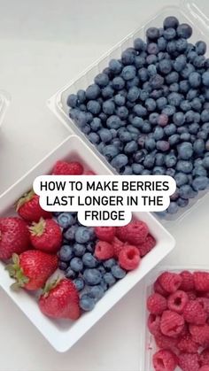 three plastic containers filled with blueberries and raspberries next to each other on a table