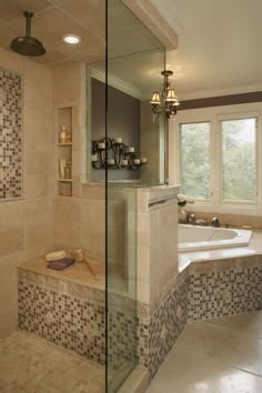 a bath room with a tub a sink and a window next to it's glass doors