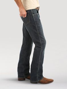 COMFORTABLE, CLASSIC, AND A LITTLE COUNTRY Wrangler® Retro® jeans are a modern take on our authentically Western jeans. Made for country rock stars, rodeo ropers, and those who just happen to have great taste, our men's retro bootcut jeans are a versatile style made to suit any occasion. They offer a comfortable mid rise, relaxed fit through the seat and thigh, and a leg opening that fits perfectly over your favorite pair of boots. Speaking to our Western heritage with a modern sensibility, our Western Jeans With Standard Cut Leg For Fall, Western Jeans Standard Cut For Fall, Casual Straight Leg Jeans For Western-themed Events, Rugged Dark Wash Bottoms For Ranch, Western Style Jeans With Five Pockets, Rugged Denim Bottoms For Ranch, Dark Wash Jeans With Five Pockets For Ranch, Rugged Denim Bottoms For Rodeo, Bootcut Jeans Men