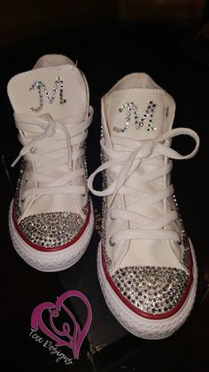 "There's nothing like having your own \"Custom Bling'd out Converse!\" These converse are fully strassed in high quality crystals. Each stone is hand placed on each shoe given you that custom bling to perfection. They can be customized in any color and can be done in infant, toddler and big kids sizes.  For Kids Sizes Please Click Here: https://www.etsy.com/listing/558550345/girls-rhinestone-converse-shoes-bling?ref=shop_home_active_5 Shoes can also be designed differently then the shoe shown above. Please send message if you would like a different design. The designing process can take up to two weeks and shoes are normally shipped 2-3 weeks after receiving the shoe.  If the item is needed before the shop turn around time and you would like to purchase, please message me BEFORE purchasing Bling Converse Shoes, Converse Shoes Custom, Rhinestone Converse, Converse Wedding, Bling Converse, Wedding Converse, Girls Shoes Sneakers, Custom Bling, Custom Converse