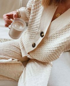 We went classic. Made of an extra-cozy fabric, the Highland Knit Cardigan has all the warmth of a bulky sweater with a weightless, cloud-like feel. It features a ribbed neckline, hem, and cuffs with a dropped shoulder and easy fit for versatile styling. Details: Ribbed turtleneck, hem, and cuffs Dropped shoulder Fabric: Size/Fit - Oversized, relaxed fit- Model is wearing a size Small/Medium Care Guide: Hand wash separate Bulky Sweater, Knit Lounge Set, Bulky Sweaters, Cella Jane, Ribbed Turtleneck, Ribbed Neckline, Lounge Set, Feel It, Lounge Sets