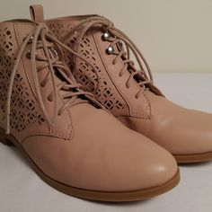 Brand New In The Box Lucky Brand Hirro Preforated Ankle Booties. They Are In Good Condition But Have Two Blemishs On One Shoe. Please See Photos. They Are A Size 9 And Made Out Of Tan Leather. The Footbed Measures 11" Long. Beige Ankle Combat Boots For Spring, Fall Boots With Perforated Toe Box And Closed Toe, Fall Boots With Perforated Toe Box, Casual Boots With Perforated Toe Box, Casual Boots With Perforated Round Toe, Ankle-high Boots With Perforated Toe Box, Trendy Lace-up Booties Medium Width, Ankle-high Boots With Perforated Toe Box For Spring, Booties Ankle Boots