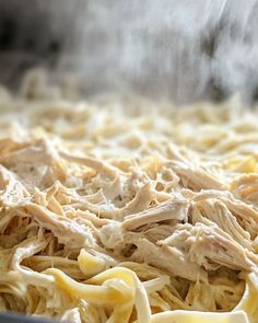 the food is being cooked in the pan