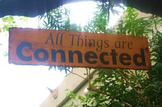 a sign that says all things are connected