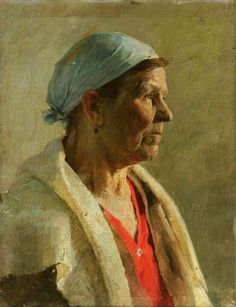 an old woman with a blue head scarf