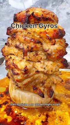 chicken gyros stacked on top of each other