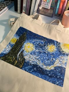 Starry night painting on a tote bag, cool artistic affordable tote bag for sale Starry Night Tote Bag, Decorating Tote Bags Ideas, Painted Tote Bag Aesthetic, Custom Tote Bag Aesthetic, Aesthetic Tote Bag Painting, Tote Bag Art Painting, Painting On Tote Bags, Tote Bags Painting, Painted Tote Bag Ideas