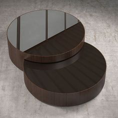 two round mirrors sitting on top of each other