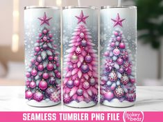 three pink christmas trees are painted on two cans