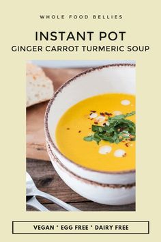 a white bowl filled with carrot tumeric soup