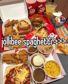 an assortment of fast food and drinks on a table