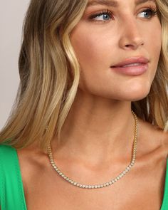 Our best-selling Baroness Tennis Necklace is perfect for layering! This iconic tennis style necklace features 111 simulated diamonds in bezel settings throughout. Perfect with a t-shirt & jeans or an elegant evening gown, the Baroness will catch everyone's eye. DETAILS: Tennis Necklace Length: 18" 111 stones Box Push Clasp SKU: N6067 MATERIALS: 18k Gold Plated Over Brass Stone: 3mm Simulated Diamonds Gold Tennis Necklace, The Baroness, Elegant Evening Gown, Melinda Maria Jewelry, Melinda Maria, Tennis Style, Eye Details, Evening Gowns Elegant, Mom Jewelry