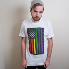 pride T-shirt Cotton T-shirt With Rainbow Print For Pride, Rainbow Crew Neck T-shirt For Pride, Pride Graphic Tee For Streetwear, White Screen Print T-shirt For Pride, Rainbow Graphic Tee For Pride, White Rainbow Pride T-shirt, Multicolor Crew Neck T-shirt With American Flag Print, White Rainbow Print T-shirt For Pride, White Pre-shrunk T-shirt For Pride