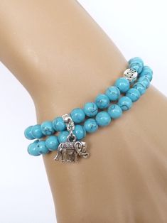 Turquoise Bracelet for girlfriend Gift daughter Elephant Bracelet for women Bracelet for her, Turquoise Jewelry Turquoise Elephant Jewelry This beautiful beaded bracelet is made with high quality 6mm Turquoise Howlite beads , 6mm accent beads and Elephante charms strung on a very strong clear elastic cord. Please choose the size for your bracelet. If you have any questions please feel free to contact me Bohemian Crystal Bracelet With 8mm Beads, Turquoise Bohemian Crystal Bracelet, Turquoise Beaded Charm Bracelet For Gift, Turquoise Beaded Charm Bracelet Gift, Elegant Turquoise Adjustable Charm Bracelet, Natural Stones Jewelry For Friendship, Turquoise Gemstone Beads Bracelets For Gifts, Turquoise Bangle Crystal Bracelet For Gift, Turquoise Howlite Beaded Bracelets As A Gift