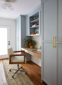 a chair sits in front of a wooden desk