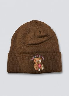 Keeping you warm and cozy in our new 90% Devil Beanie. This classic brown colored beanie features a soft ribbed fabrication with an embroidered teddy bear graphic on the front and a fold-over cuff. Soft and stretchy construction Ribbed knit fabrication One size fits most Unisex Return Policy Shipping Policy Casual Brown Cotton Beanie, Casual Warm Brown Beanie, Trendy Warm Brown Beanie, Trendy Brown Beanie For Cold Weather, Bear Graphic, Warm And Cozy, Ribbed Knit, Cuff, Teddy Bear