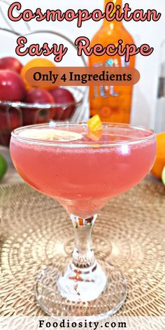 a close up of a drink in a glass on a table