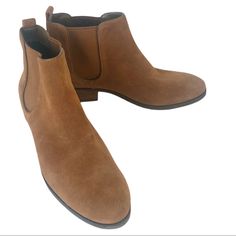 Discover Sophistication With The Cole Haan Women's Landsman Bootie Ii In Genuine Brown Leather. These Closed Toe Ankle Chelsea Boots Offer A Perfect Blend Of Comfort, Style, And Luxury. Featuring Double Side Goring And A Convenient Back Tab For Easy Entry, These Boots Are Not Only Fashionable But Also Practical. The Fabric-Lined Interior And Fully Padded Sock Lining Ensure Maximum Comfort, While The Full Rubber Outsole And Mini Stacked Heel Provide Durability And A Touch Of Elegance. Elevate You Ankle Chelsea Boots, Cole Haan Women, Cole Haan Shoes, Comfort Style, Stacked Heel, Cole Haan, Bootie, Fashion Statement, Chelsea Boots