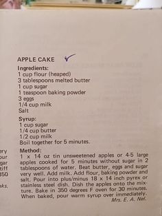 an old recipe book with instructions on how to bake apple cake in it's pages