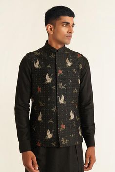 Black sleeveless jawahar jacket with metal and multicolor thread embroidery in bird and floral pattern.
Components: 1
Pattern: Embroidery
Type Of Work: Metal, thread
Neckline: Mandarin collar
Sleeve Type: Sleeveless
Fabric: Silk
Color: Black
Other Details: 
Note: Inner kurta and pant worn by the model is not for sale
Occasion: Destination Wedding - Aza Fashions Fitted Black Nehru Jacket With Embroidery, Black Nehru Jacket With Resham Embroidery For Wedding, Formal Black Nehru Jacket With Resham Embroidery, Fitted Black Embroidered Nehru Jacket, Unstitched Black Embroidered Nehru Jacket, Nehru Jacket, Nehru Jackets, Pattern Embroidery, Jacket For Men