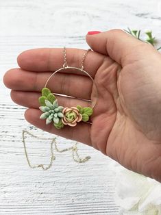 "Succulent necklace for every lovely day. The life of the real succulents is too short to make some flower necklaces with them. Instead of real flowers, I offer you these beautiful handmade flowers that will never fade. Such a piece of floral jewelry can please you for many years. It will beautifully adorn your look in any season of the year. Details: * Designed with handmade flowers out of cold porcelain (air dry clay); * Diameter of the pendant is about 1.5 inches (3.8 cm); * Chain length is a Botanical Style Green Flower Jewelry, Nature-inspired Green Flower Necklaces, Unique 3d Flower Jewelry, Unique 3d Flower Shaped Jewelry, Succulent Necklace, Necklace Gift Ideas, Flower Necklaces, Clay Pendants, Polymer Clay Flower Jewelry