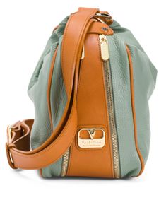 I have for "Buy It Now" a Valentina Convertible backpack or shoulder hobo bag made in Italy. This bag is a very high quality in a soft green Italian leather with a supple pebbled texture that they call Jade and the contrasting  cognac leather straps and trim.  This bag can be carried as a shoulder or hobo bag or used as a backpack. The strap when used as a backpack are adjustable and around 35 inches long. When used as a shoulder or hobo bag, the strap drop can also be adjusted and is around 12 inches or more depending on how you set it up. There are two removable snap on straps that  hold the straps in place for the way you wish to use the bag. The hardware is done in a polished golden finish for extra richness and has the brand logo lettering on the  zipper pulls, the rivets and the poli Green Hobo Bag With Zipper For Travel, Green Travel Hobo Bag With Zipper Closure, Travel Green Hobo Bag With Zipper Closure, Luxury Green Soft Leather Hobo Bag, Green Soft Leather Backpack For Everyday, Versatile Green Hobo Bag With Zipper Closure, Green Leather Hobo Bag With Adjustable Strap, Green Textured Leather Bag For On-the-go, Green Leather Tote Backpack