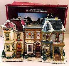 a christmas village set in its original box