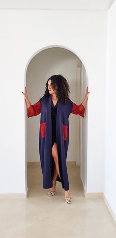 This is a very beautiful kimono ethically designed and made in Morocco.DETAILS80% viscose, 20% elastaneNavy blue with red lace arms and pocketsMaxi Length 1.40 meter /55 inchOne size fits allHandmade in MoroccoGot a question!! don't hesitate to contact me :) Red Maxi Dress With Kimono Sleeves, Red Long Sleeve Maxi Dress For Beach Cover-up, Free Size Maxi Dress With Kimono Sleeves, Maxi Length Abaya For Beach Cover-up, Red Free Size Long Maxi Dress, Red Free Size Maxi Dress, Red Maxi Kimono For Vacation, Red Long Sleeve Kimono For Beach Cover-up, Red Maxi-length Kimono For Vacation