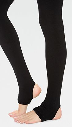 Plush Fleece Lined Tights with Stirrup | SHOPBOP Winter Sports Leggings Made Of Elastane, Winter Footless Tights, High Stretch Full Length Elastane Leggings, Fitted Tights For Barre, Solid Stretch Footless Unitard, Fitted Solid Tights For Barre, High Stretch Footless Hosiery For Winter, High Stretch Footless Winter Hosiery, Winter Stretch Elastane Bottoms