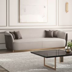 a living room scene with focus on the couch and coffee table