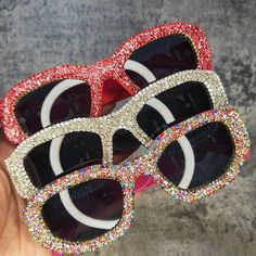 Glitter Rhinestone Oversized Round Lens Sunglasses with UV400 Protection Upgrade your fashion with our Oversized Round Lens Diamond Bling Sunglasses. These stunning shades feature a glitter rhinestone frame that adds a touch of glamour to any outfit. Chic and Protective Equipped with UV400 protection, not only will you look chic, but you will also keep your eyes safe from harmful rays. These sunglasses are perfect for any occasion, whether it's a day at the beach, a music festival, or a casual d Party Sunglasses With Bling And Glass Material, Glamorous Party Sunglasses With Bling, Trendy Party Sunglasses With Rhinestones, Trendy Bling Sunglasses With Glass Material, Trendy Bling Sunglasses With Glass, Trendy Rhinestone Party Sunglasses, Trendy Bling Sunglasses With Glass Lenses, Sunglasses For Small Faces, Bling Sunglasses