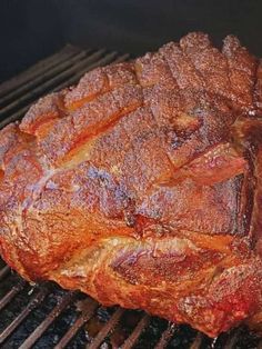 a steak is cooking on the grill with it's meat marinated in oil