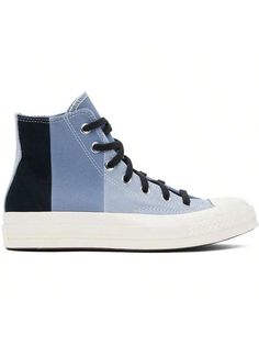 Converse 
Blue & Navy Chuck 70 Patchwork Suede High Top Sneakers 
High-top paneled canvas and suede sneakers in tones of blue and navy. 
. Rubber cap toe 
. Lace-up closure 
. Logo patch and eyelets at inner side 
. Cushioned Ortholite® footbed 
. Canvas lining 
. Rubberized logo patch at midsole 
. Treaded rubber sole 
. Contrast stitching in white 
Supplier color: Rainy daze/Thunder daze/Black 
Upper: leather, textile. Sole: rubber. 
Made in Viet Nam. 
241799M236061 
Blue & Navy Chuck 70 Patch Navy Chuck 70, Casual Athletic Shoes, Men Sneakers, Chuck 70, Suede Sneakers, Outdoor Shoes, High Top, Top Sneakers, High Top Sneakers