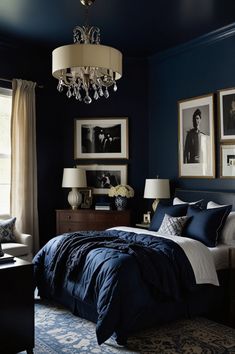 a bedroom with blue walls and pictures on the wall