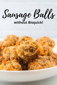 a white bowl filled with sausage balls on top of a wooden table and text overlay reads sausage balls without biscuits