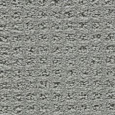 an up close shot of the texture of a carpet with gray and white colors on it