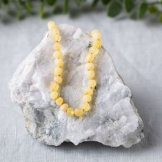 🔆 Features genuine Baltic Amber for sunshine, vitality, and balance. 🔆 Created using 4-6mm Baltic amber and a screw clasp closure. 🔆 Jewelry inspired by nature! Our jewelry is handmade using natural gemstones. Each piece we create is unique! Baltic Amber, aka "Gold of the Sea" or "solidified sunlight," is one of the world's oldest and most envied treasures. It is a fossilized tree resin formed by light and life, preserved by time, and washed up on the shores of the Baltic Sea. It is warm to the touch and light to wear. Baltic Amber is revered for its high concentration of succinic acid. Each bead is a beautiful and unique piece of history - a fossil from an ancient forest! Our small sizes are individually hand-knotted between each bead so that if the necklace were to break, only one bea Amber Bead Necklace 8mm As Gift, Amber Necklace With 8mm Beads For Gift, Amber Necklaces With 8mm Beads For Gift, Yellow Beaded Jewelry For Meditation, Amber Single Strand Spiritual Necklace, Minimalist Amber Jewelry For Healing, Round Amber Necklaces For Meditation, Adjustable Hypoallergenic Amber Jewelry, Yellow Necklaces With 8mm Beads For Gifts