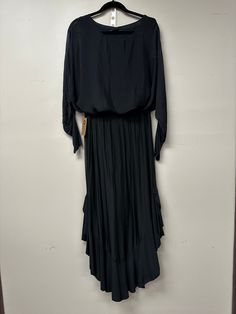 Italian monochrome, silky, elegant, top and lightly ruffled palazzo bottom, the bottom almost looks like a skirt, to wear to a special night out, very comfortable and fun, , the top is a caftan style blouse, simple and elegant, one size, 55% Silk 45% Viscose Flowy Evening Maxi Dress With Ruffled Skirt, Flowy Casual Maxi Skirt For Party, Casual Flowy Maxi Skirt For Party, Flowy Ruffled Skirt Dress For Night Out, Chic Flowy Maxi Skirt For Party, Chic Fall Maxi Dress With Flowy Skirt, Black Flowy Rayon Maxi Dress, Flowy Maxi Dress For Night Out, Bohemian Solid Color Party Maxi Dress