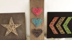 three wooden wall hangings with hearts and stars on them, one is made out of string