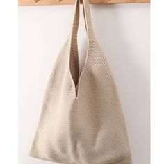 Knitted Fabric Solid Color Mini Handbag Beige Unlined Grannycore, Minimalist, Light Academia 10 In H X 8 In W Cream Knitted Bag For Everyday Use, Cream Knitted Bag, Cream Knitted Everyday Bag, Beige Knitted Shoulder Bag For Everyday Use, Beige Knitted Shoulder Bag, Everyday Beige Knitted Shoulder Bag, Beige Knitted Shoulder Bag For Daily Use, Neutral Casual Shoulder Bag For Errands, Casual Neutral Shoulder Bag For Errands