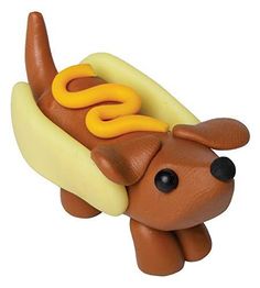 a toy hot dog with mustard and ketchup on it's buns