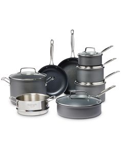 an assortment of pots and pans on a white background with the lid open to show them