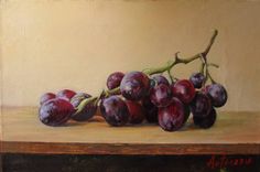 a painting of plums on a table with one branch still attached to the other