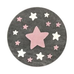 a round rug with pink and white stars on it