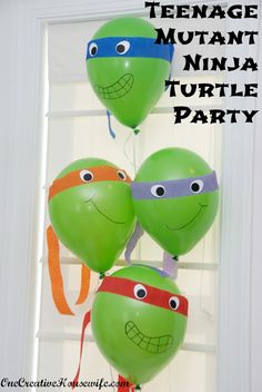 three green balloons with ninja turtles on them