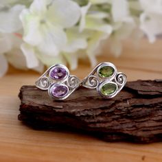 925 Sterling Silver Natural Cut Garnet, Cut Amethyst, Cut Blue Topaz, Cut Peridot Stone Ring, Bypass Two Stone Women Silver Ring Jewelry Stone Material:-  Garnet, Amethyst, Blue Topaz, Peridot Weight (Approx.):- 4.86 Gram Length:- 16 mm Width:- 2 mm  Height:- 5 mM Stone Size (Approx.):- 8 x 6 mm Oval Total Number of Stones:  2 Stone Setting: Bezel Setting Metal: 925 Sterling Silver Finish: High Polish GN-R-1030 Sterling Silver Multi-stone Amethyst Ring, Multi-stone Amethyst Ring In Sterling Silver, Peridot Stone, Silver Jewelry Rings, Multi Stone Ring, Multi Stone, Ring Jewelry, Stone Settings, Stone Ring