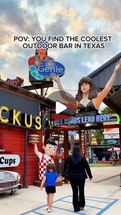 two women and a child are standing in front of a store with an advertisement for the ice cream parlor